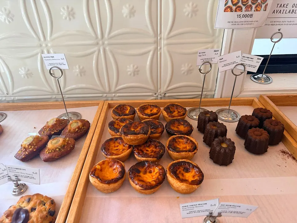 Bakery display case with bread and cookies