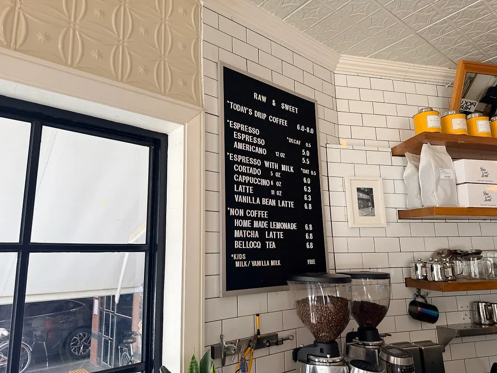 Coffee menu board at Low & Sweet Bakery