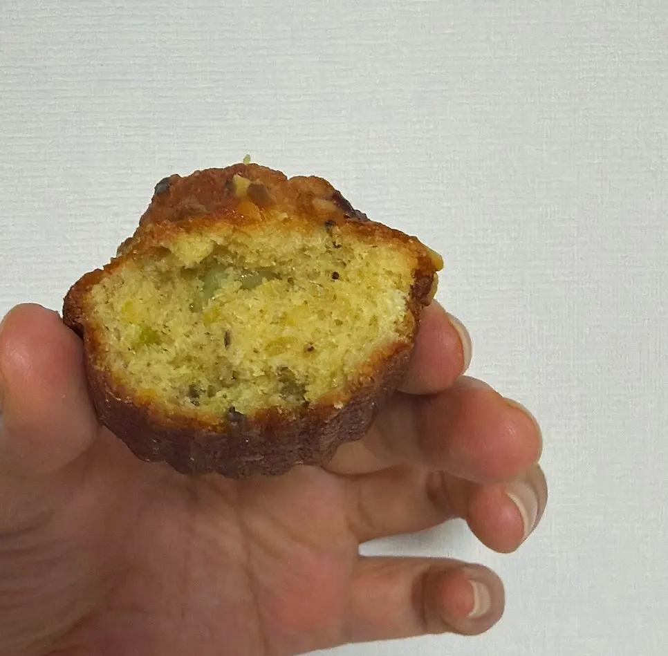 Cross-section of a bitten pistachio madeleine