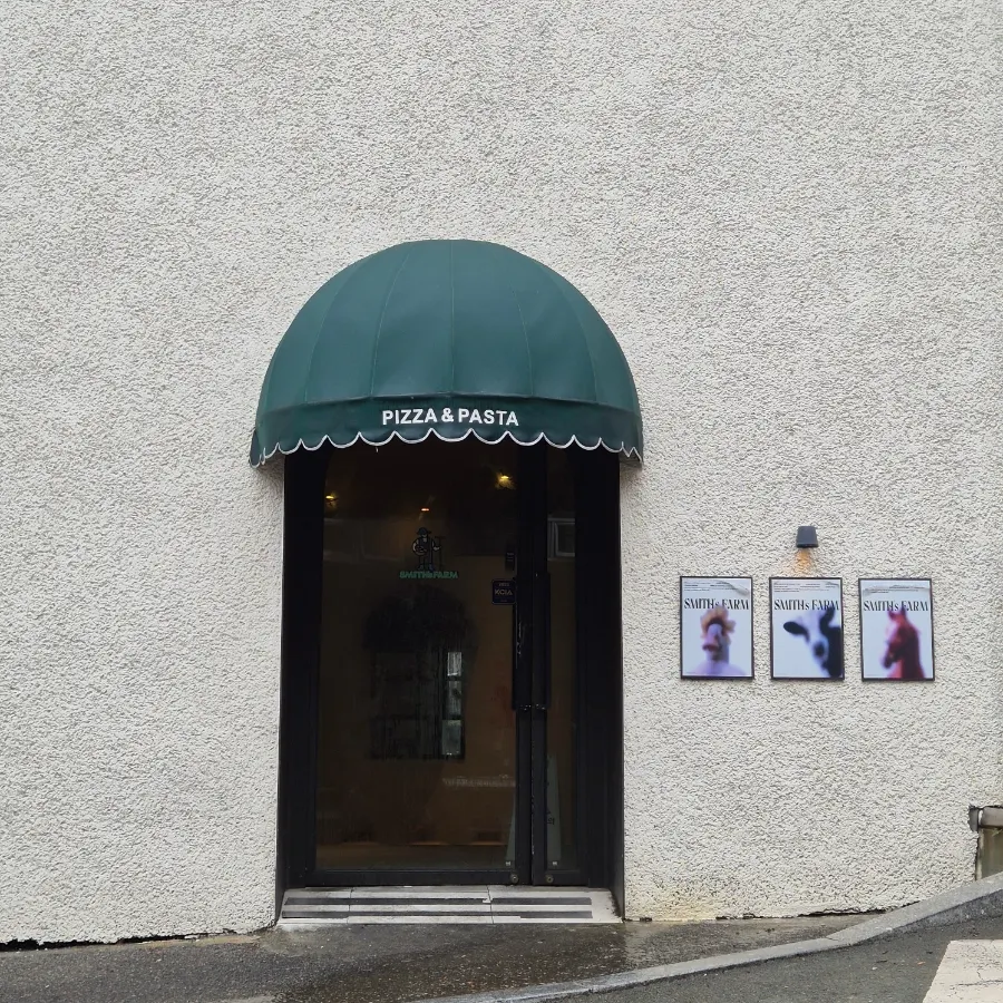 Store entrance decorated with charming little props