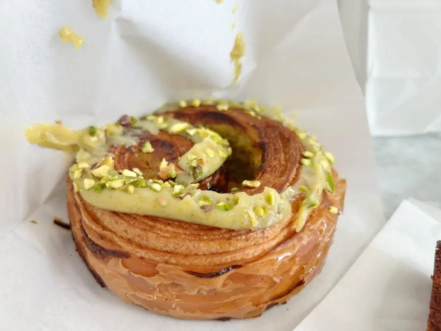 Gorgonzola financier, egg tart, and pistachio swirl