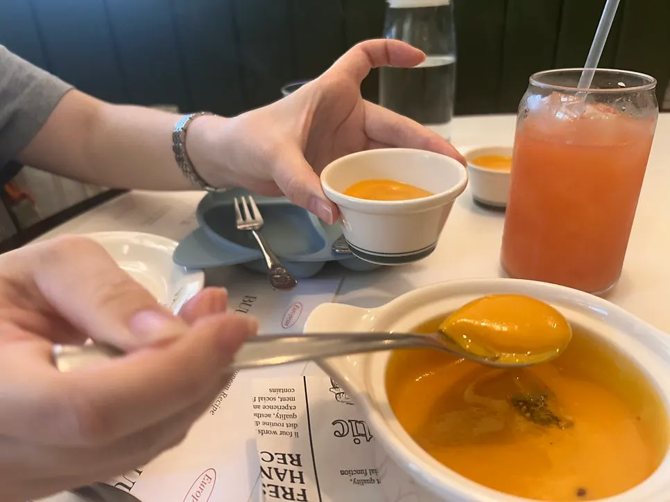 Start of the meal with pumpkin soup