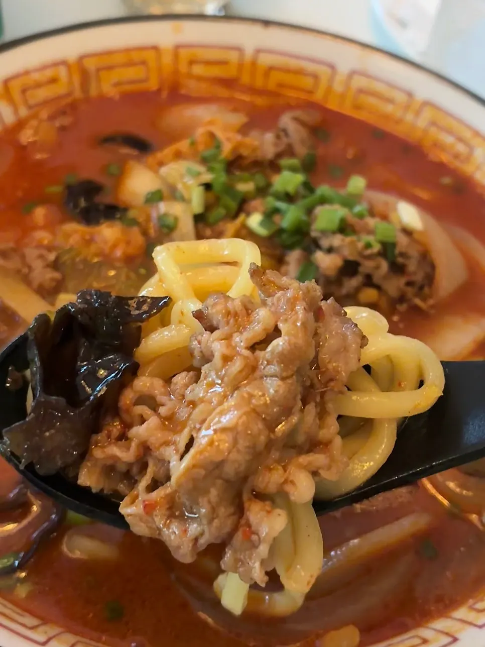 Jjamppong broth with wood ear mushrooms and beef belly