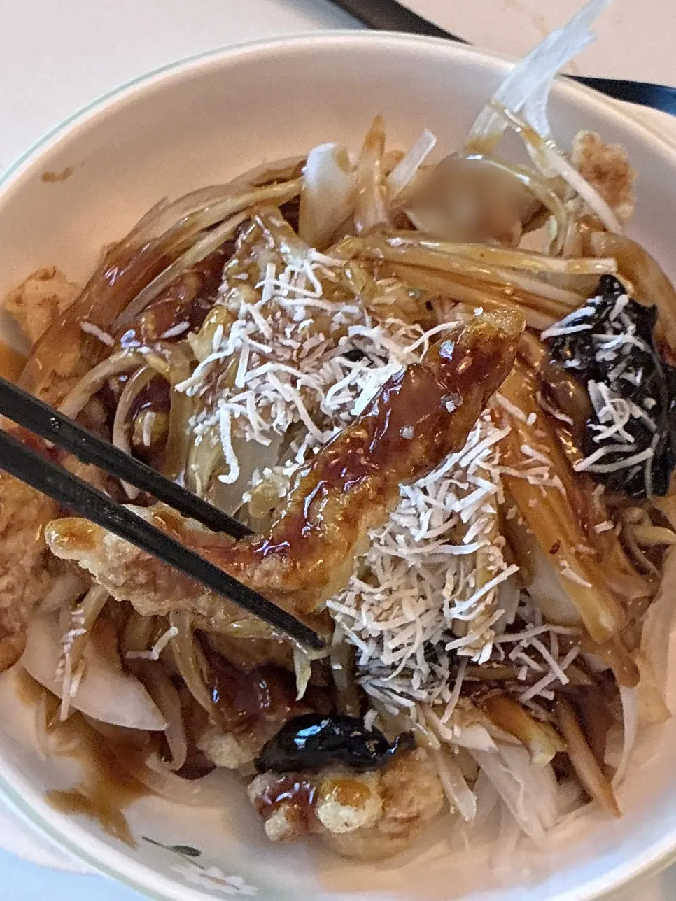 A plate of black vinegar pork sweet and sour pork