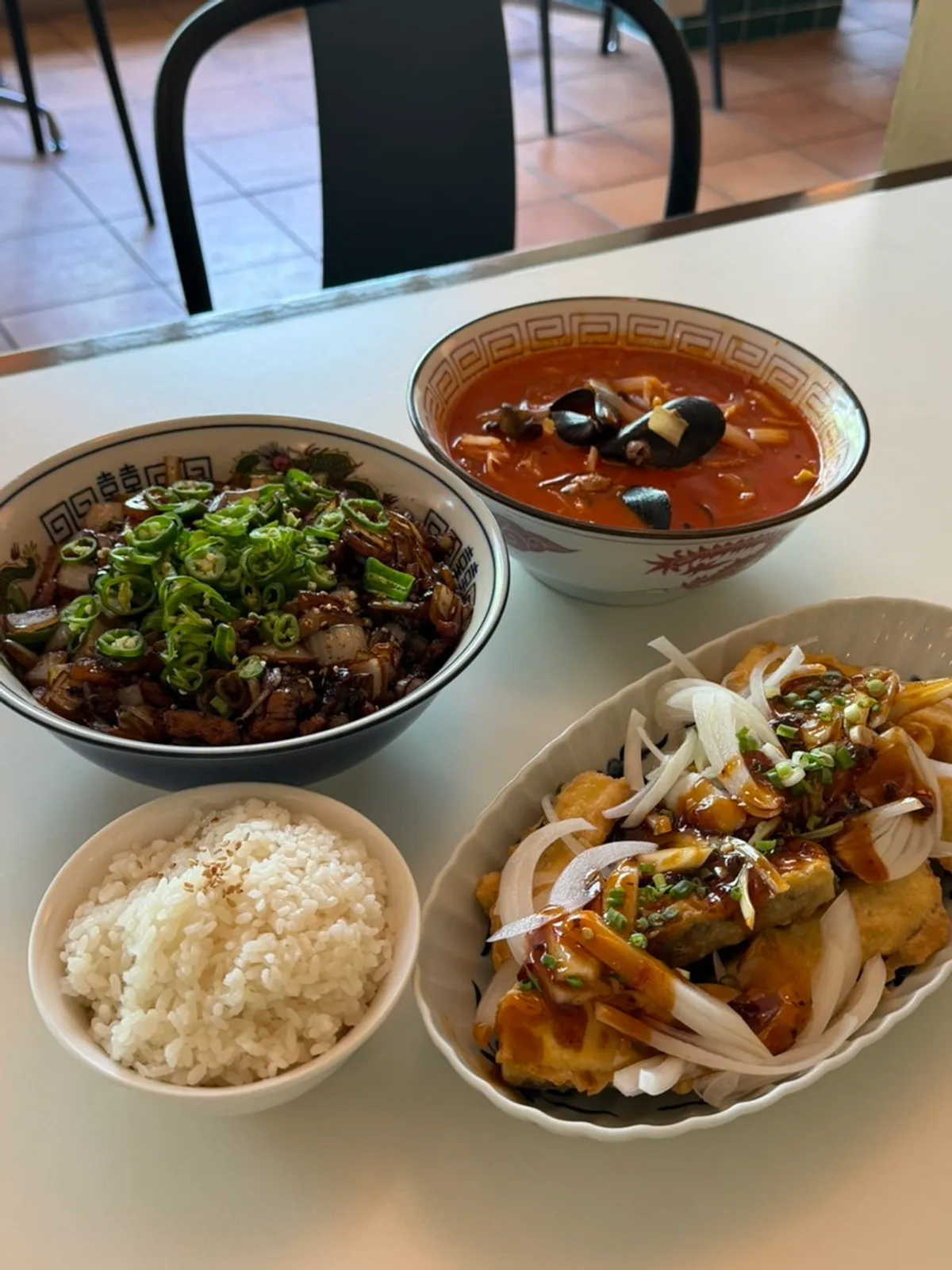 A full spread of gochu-ganjjajang, seafood jjamppong rice, and yuxiang eggplant at Bueokgan Chinese Haeundae Branch