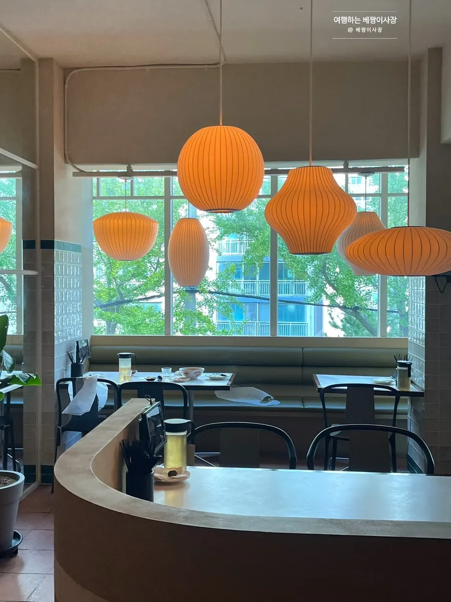 Interior of Bueokgan Chinese lit with warm lighting