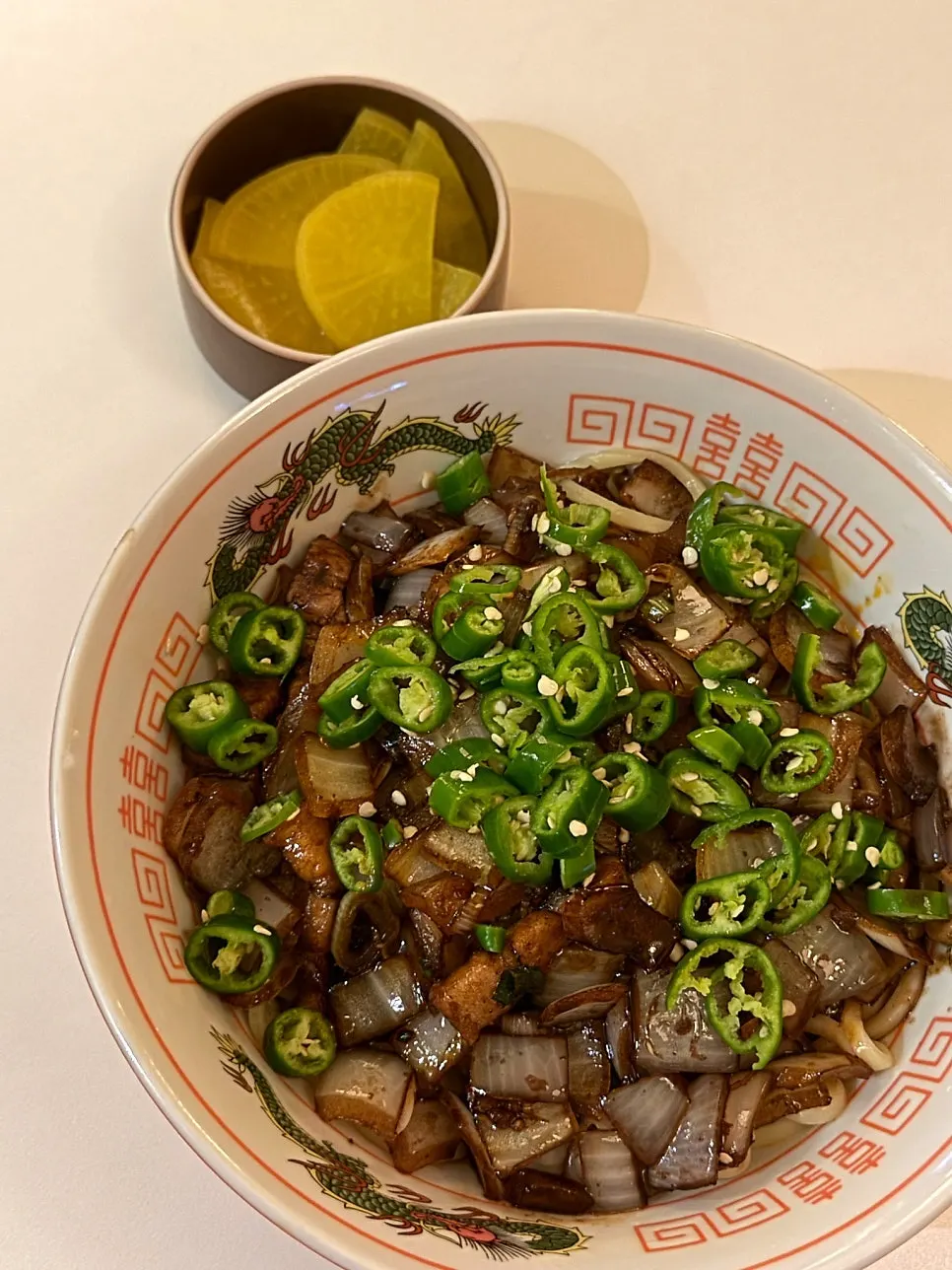 Chili jjajang piled high with chili pepper toppings