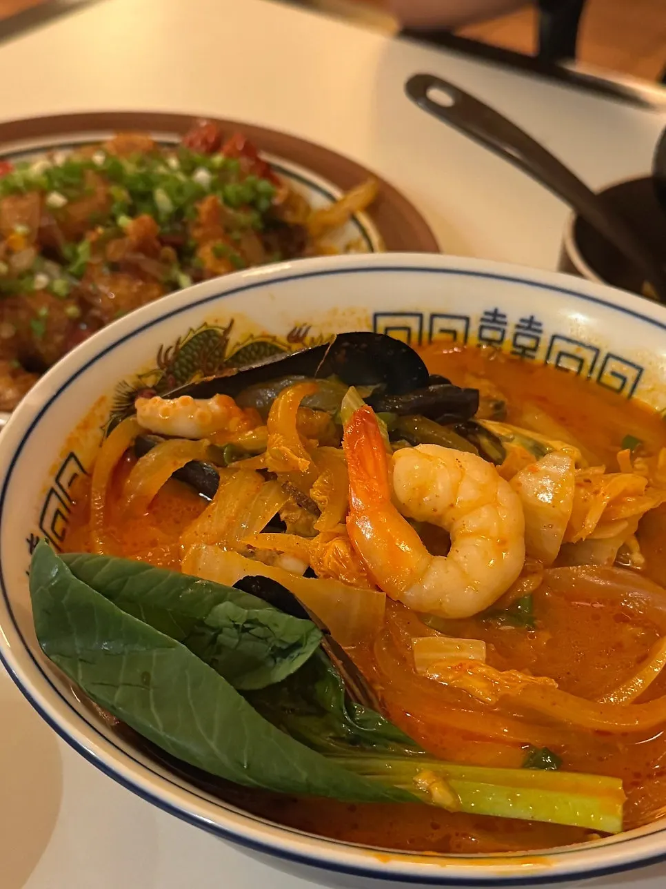 Close-up of springy shrimp inside the jjamppong broth