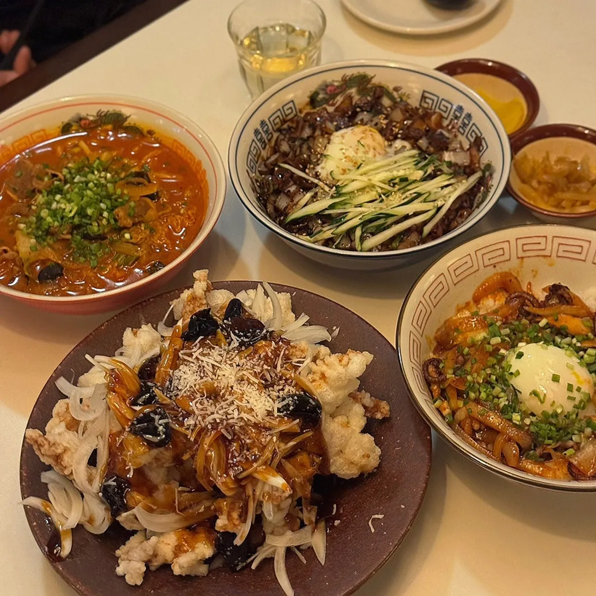 A full table of Chinese dishes ordered by a family