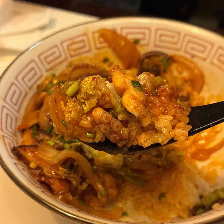 Chinese-style rice bowl with octopus and poached egg