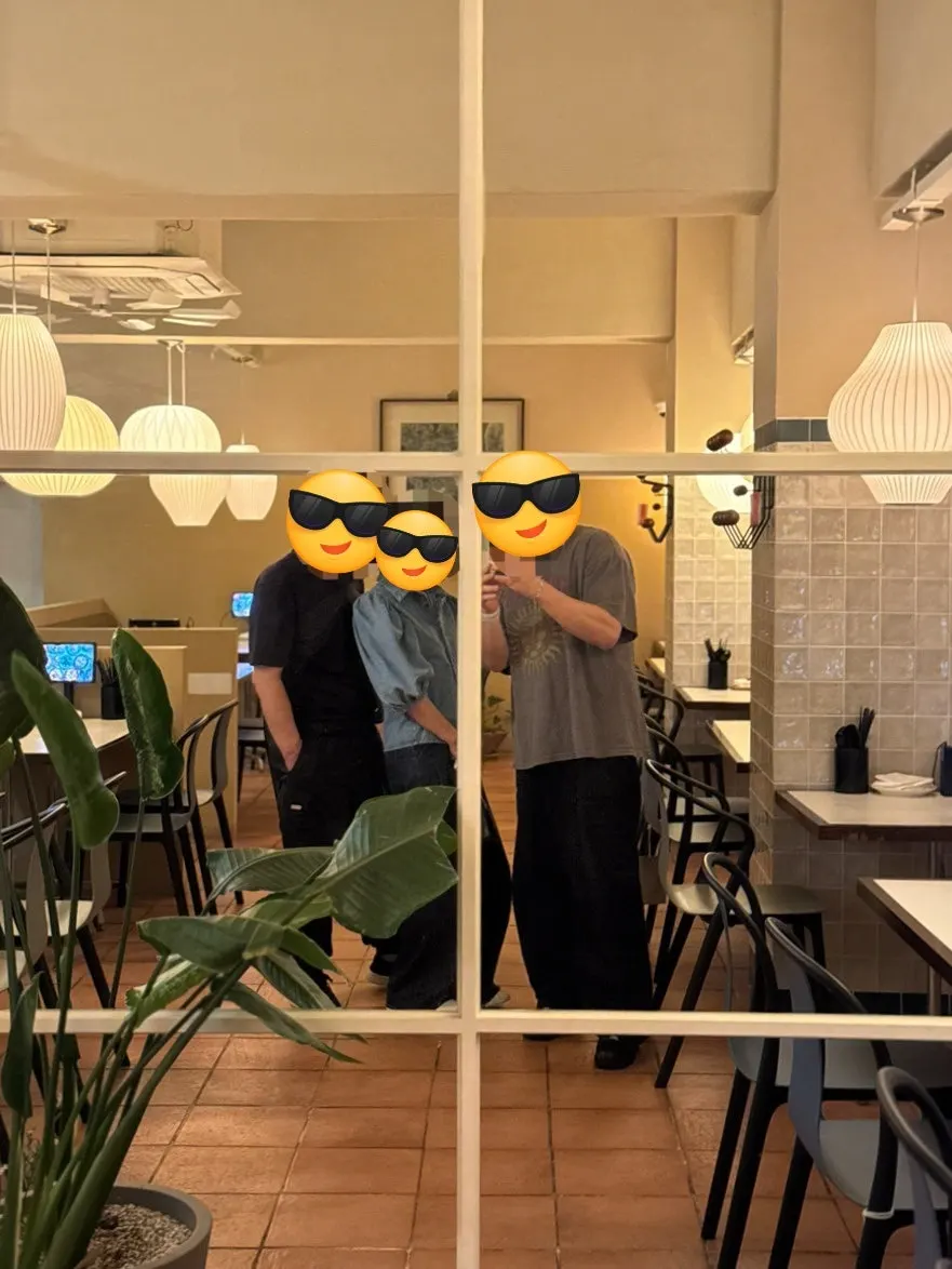 Three family members eating out together