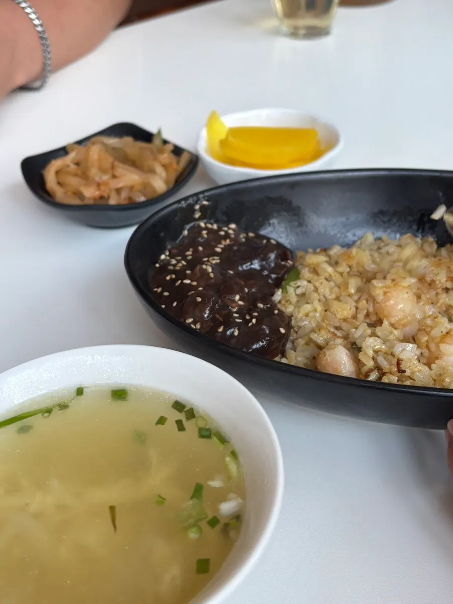 Jjajang sauce served alongside the shrimp fried rice