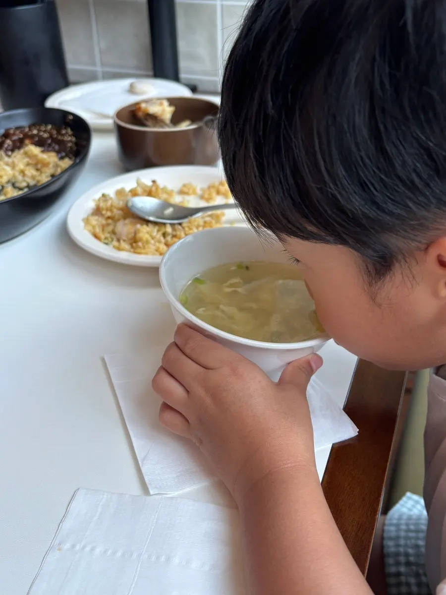 Egg drop soup served with the shrimp fried rice