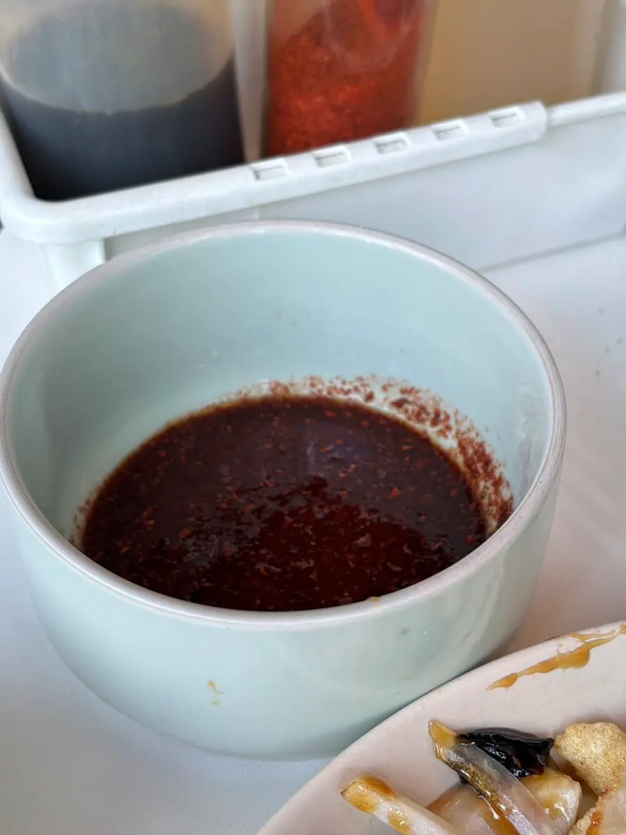 A dipping sauce made from soy sauce and chili flakes