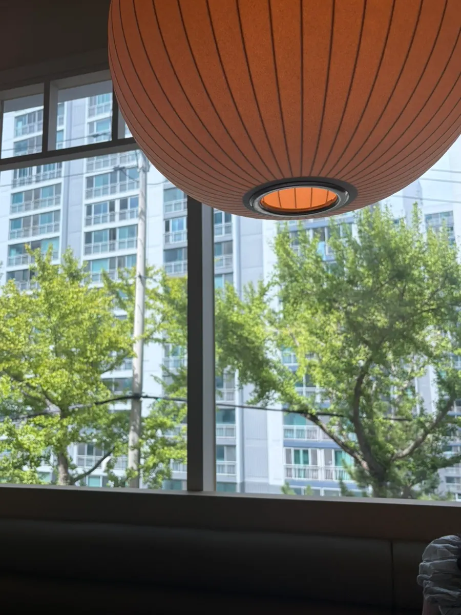 A seat by the floor-to-ceiling window, great for photos