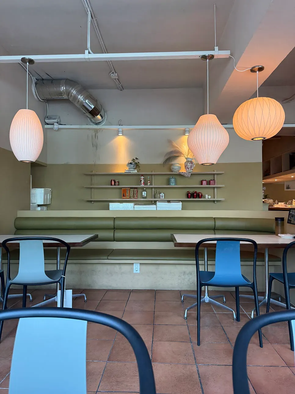 Dining hall with warm lighting and modern furniture