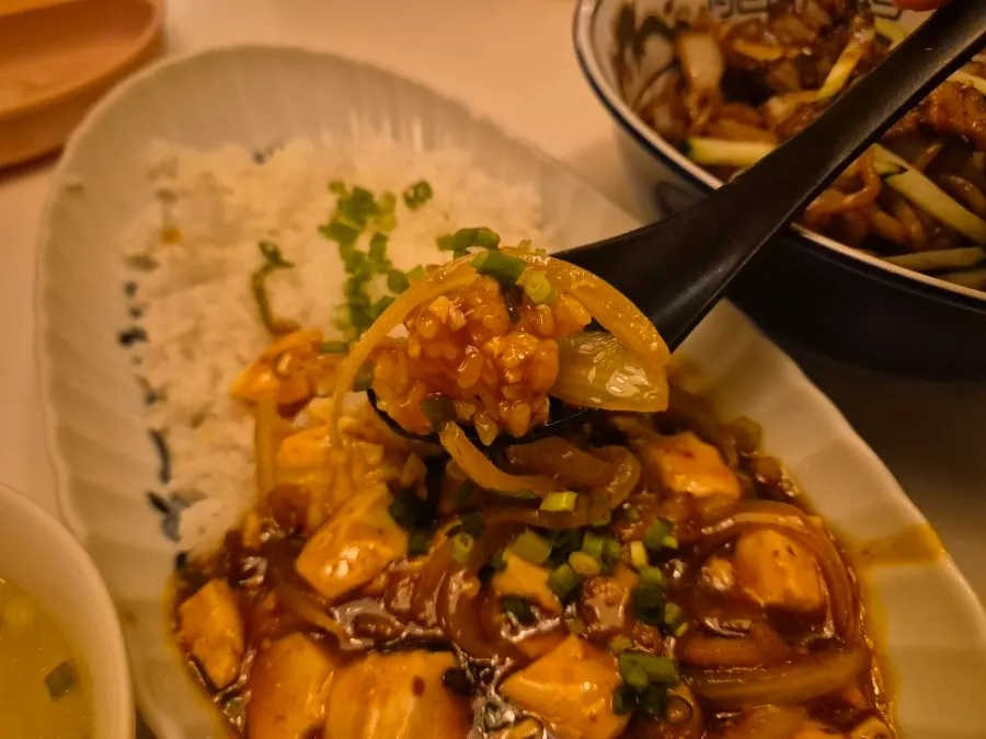 Mapo tofu rice bowl topped with tofu and sauce