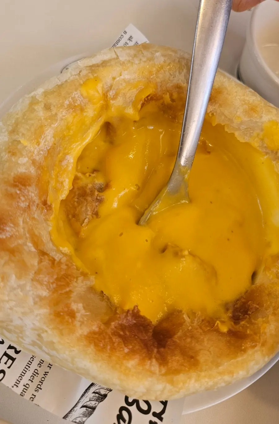 Pumpkin soup topped with pastry