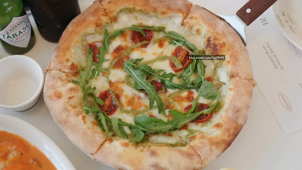 Full shot of the basil margherita pizza