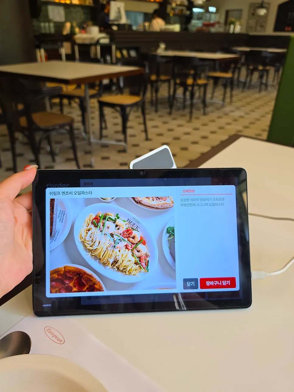 Tablet ordering screen on the table