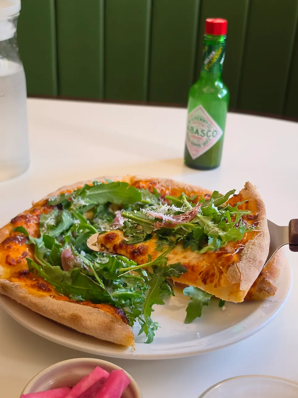 Cross-section of the pizza's thin dough