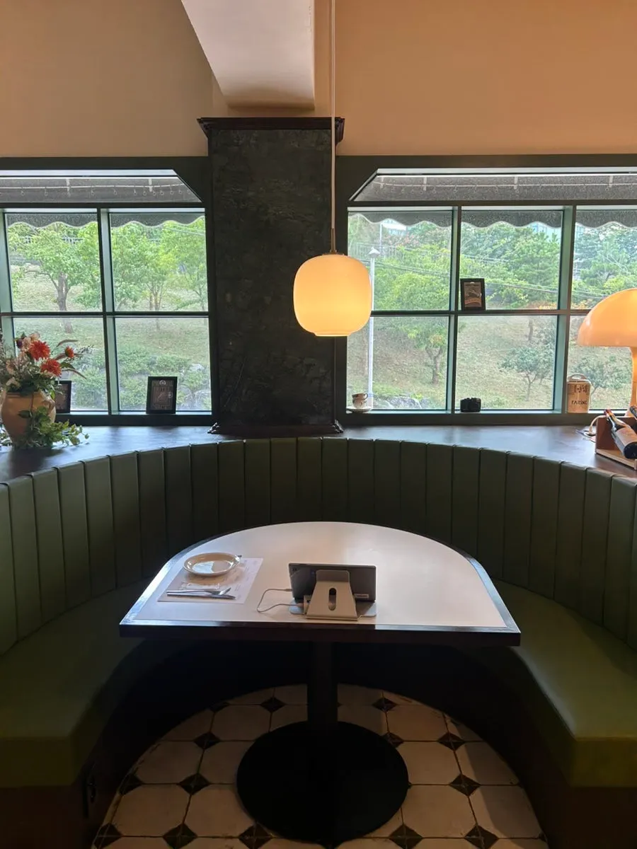 Bueokgan's signature semicircle table with a view through the window