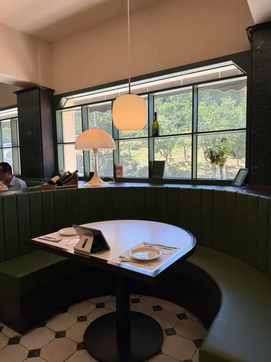 Half-moon sofa seating at Bueokgan Haeundae Branch
