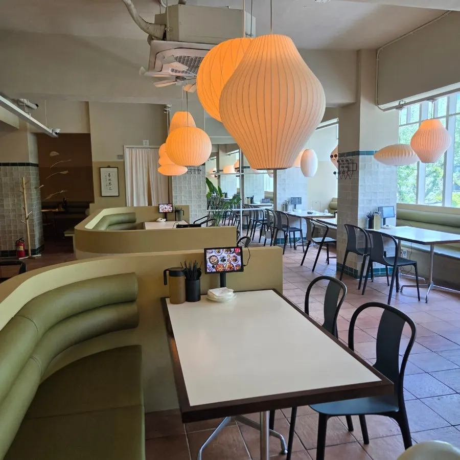 Interior with large windows and table lamps