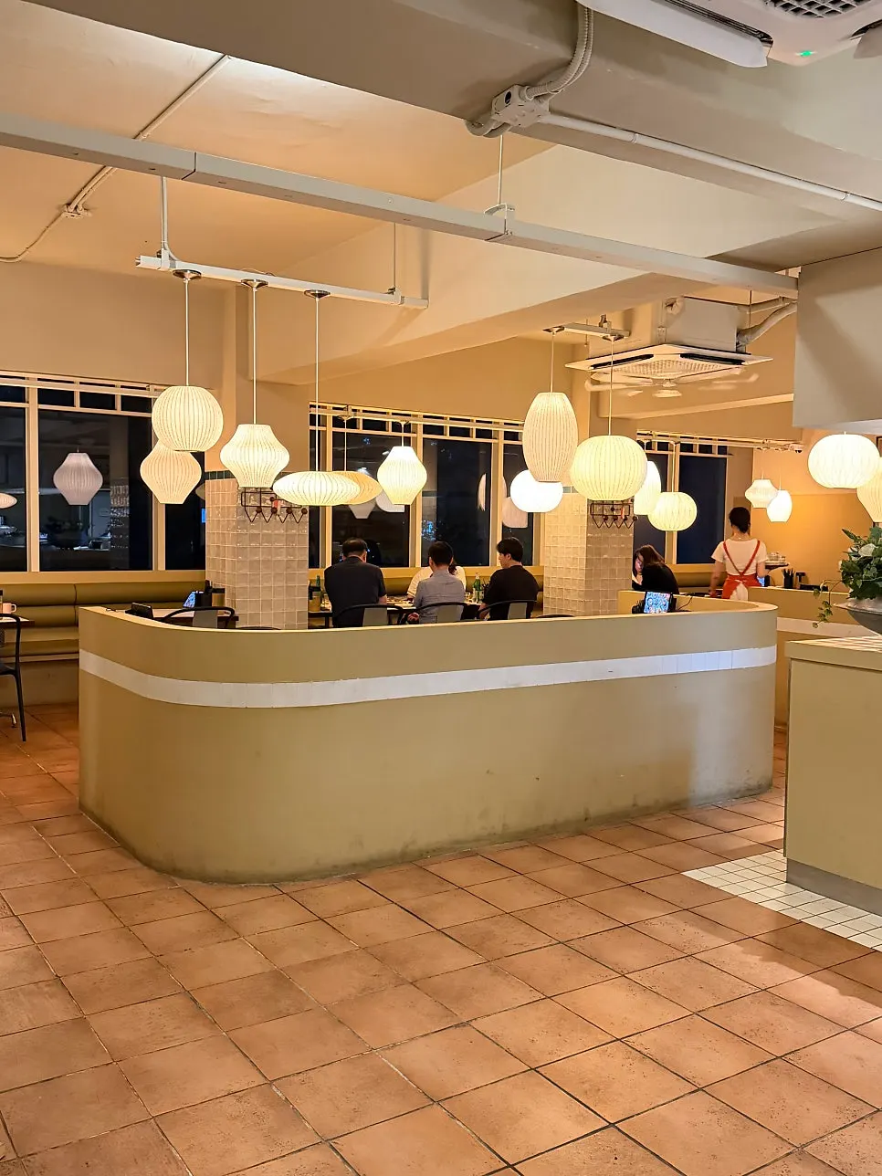 Dining hall seating with bubble lamp lighting