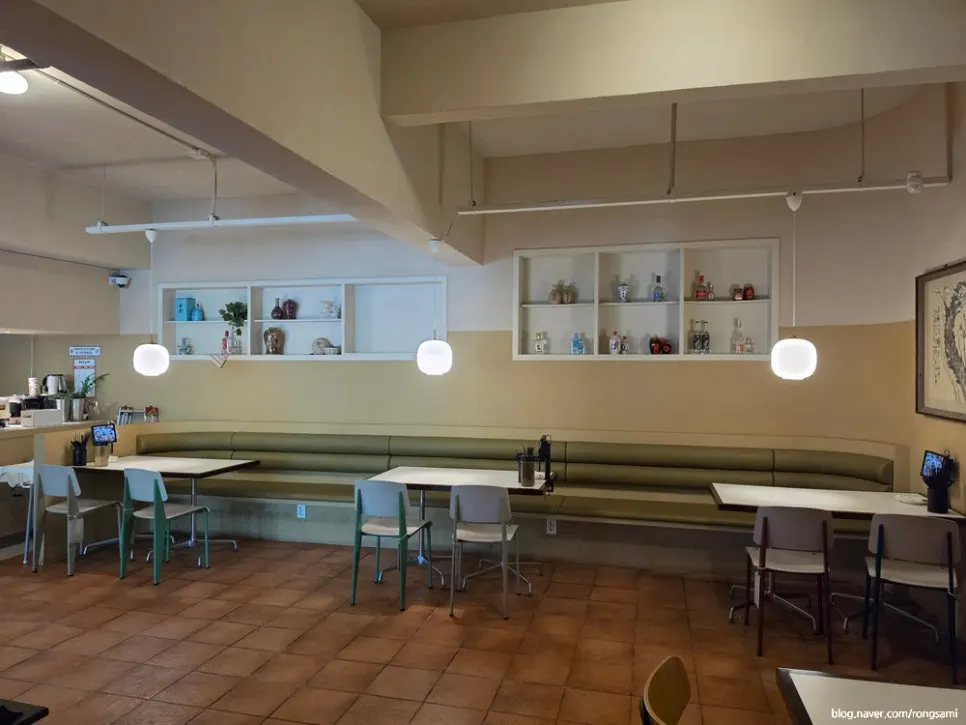 Interior of the restaurant with a half-open kitchen visible