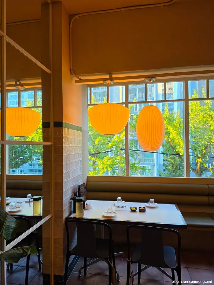 Dining hall lit with George Nelson bubble lamps