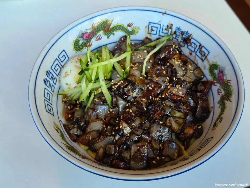 Table spread of jjajangmyeon, jjamppong, and tangsuyuk