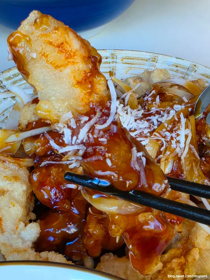 Black vinegar pork loin tangsuyuk served with sauce
