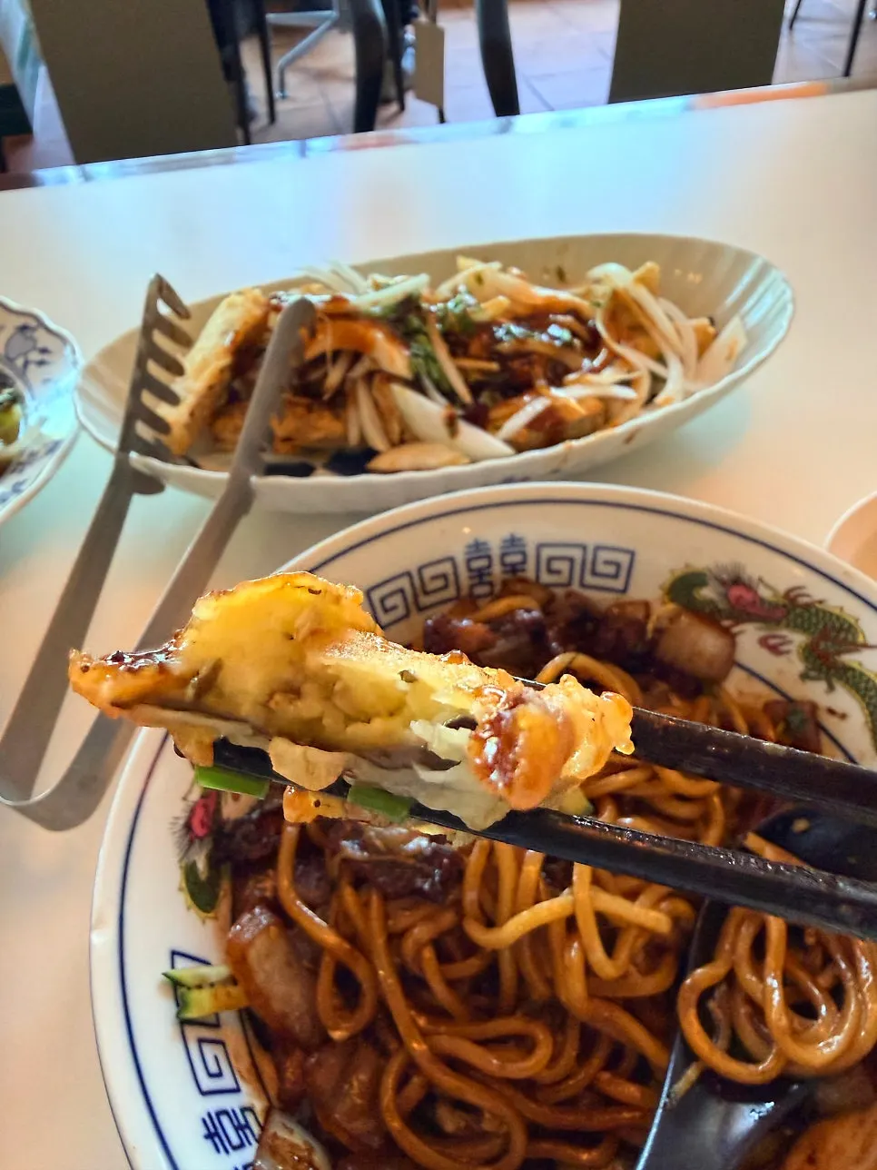 A plate of yuxiang eggplant coated in sauce