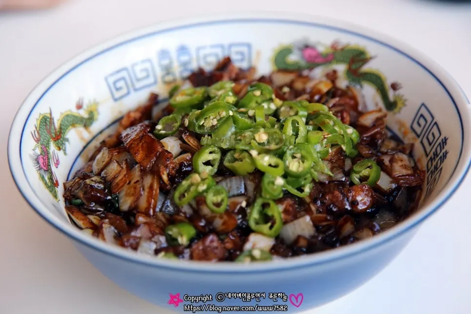 Table spread with jjajangmyeon, jjamppong, and sweet and sour pork