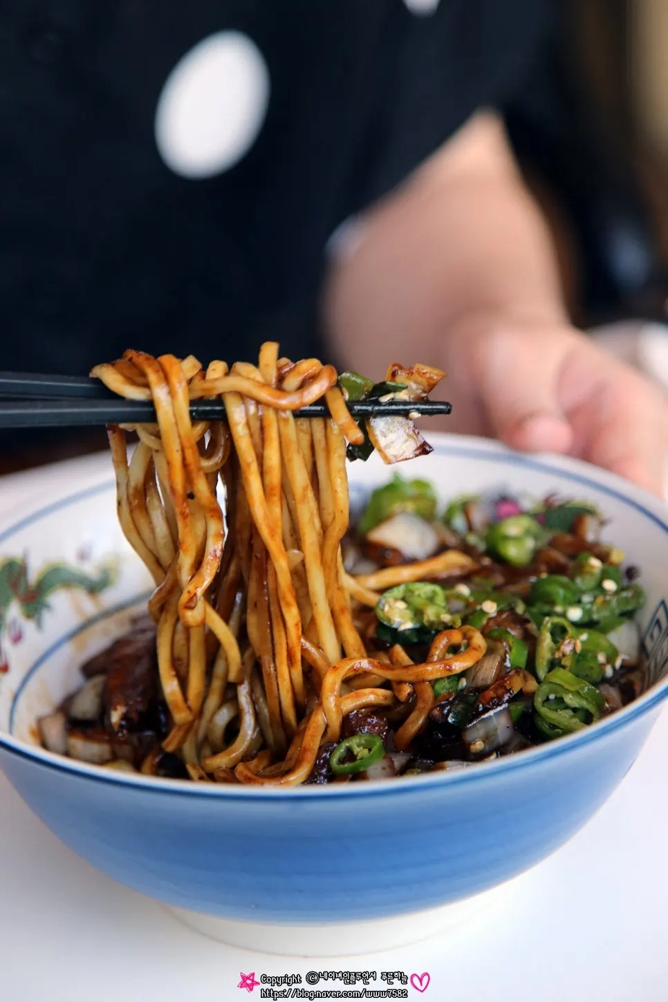 Close-up of glossy chili jjajangmyeon