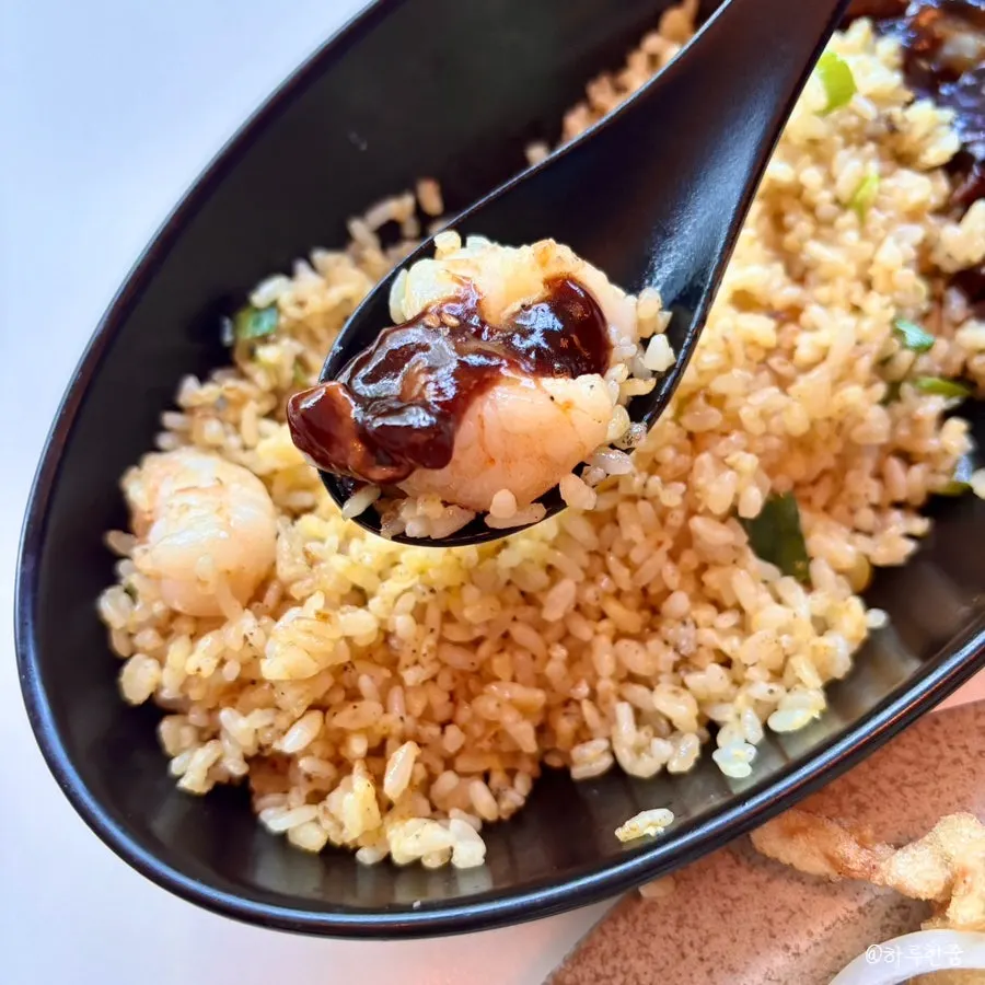 Close-up of fried rice with shrimp mixed in