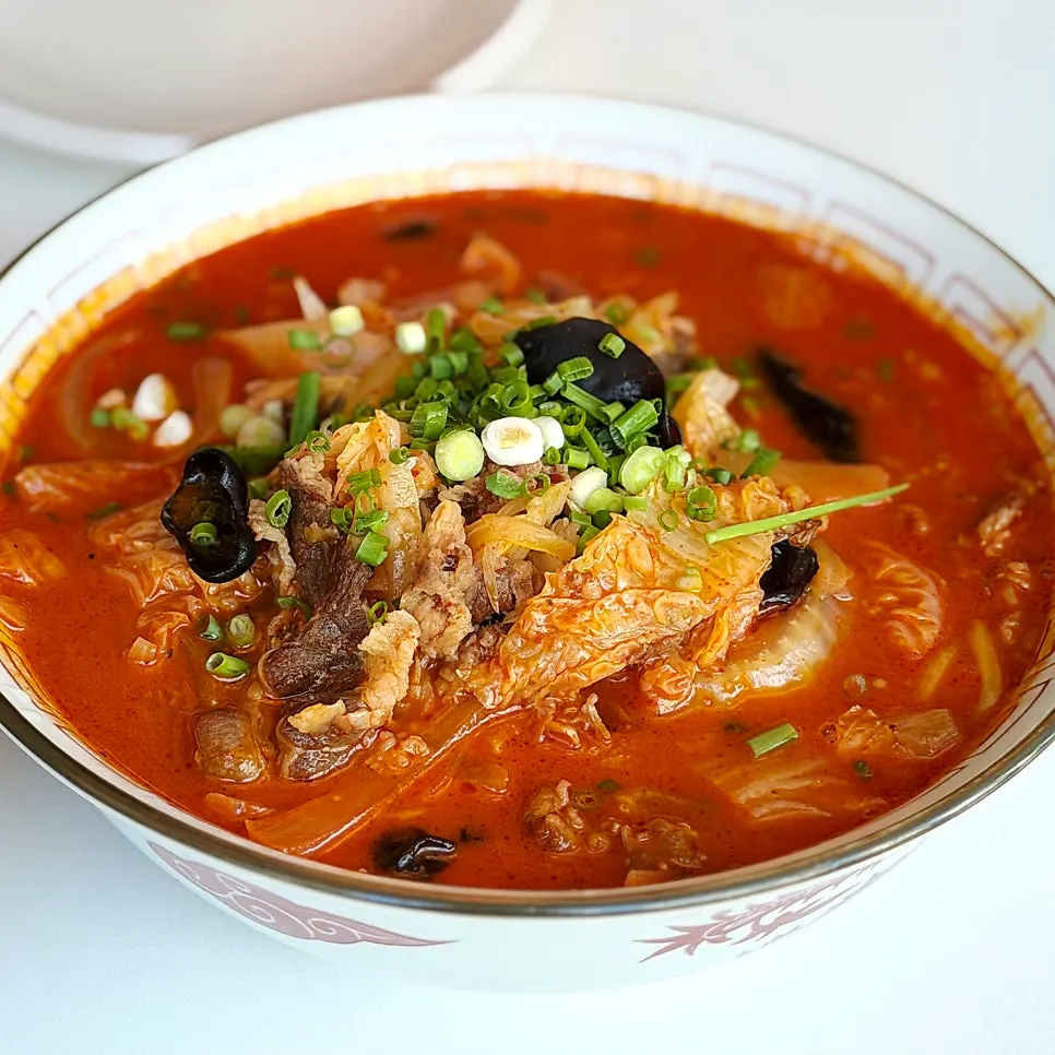 Jjamppong broth loaded with meat and vegetables