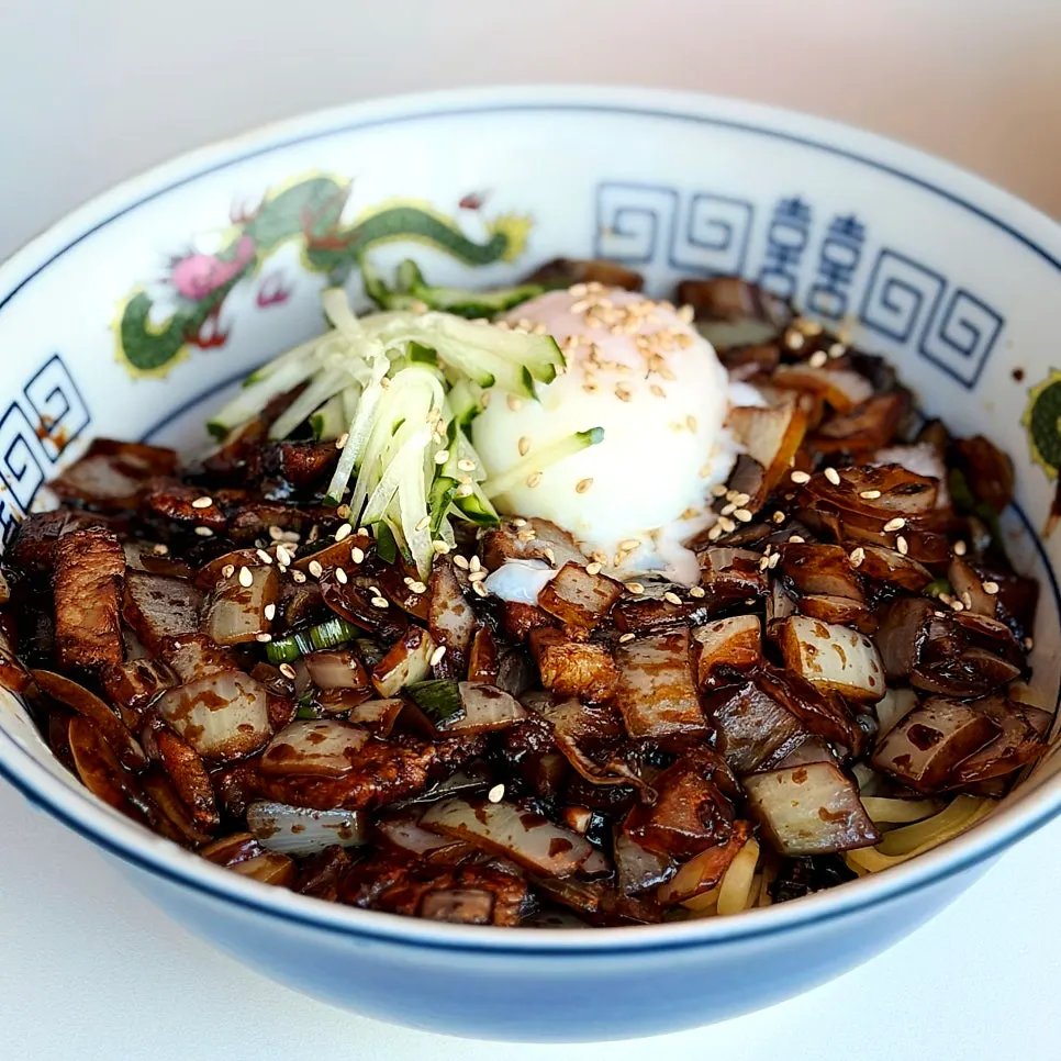Ganjjajang noodles mixed with the burst poached egg