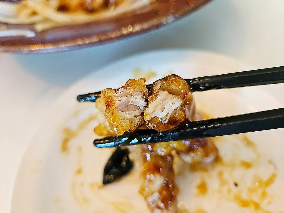 Cross-section of sweet and sour pork packed with sirloin