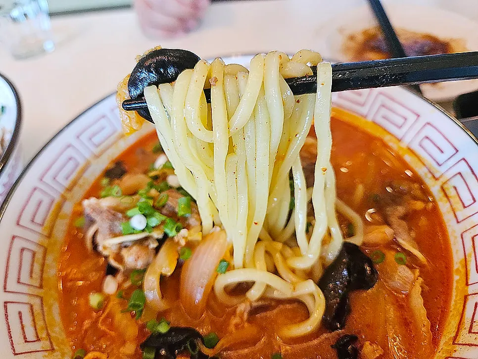 Beef belly served on top of the jjamppong