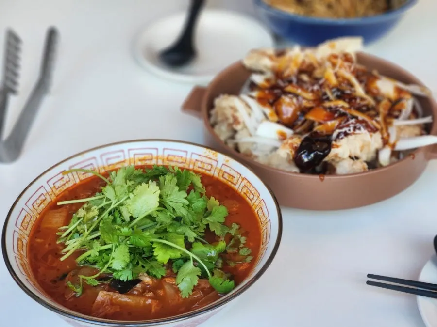 Chinese dishes set out on the table at Bueokgan Chinese