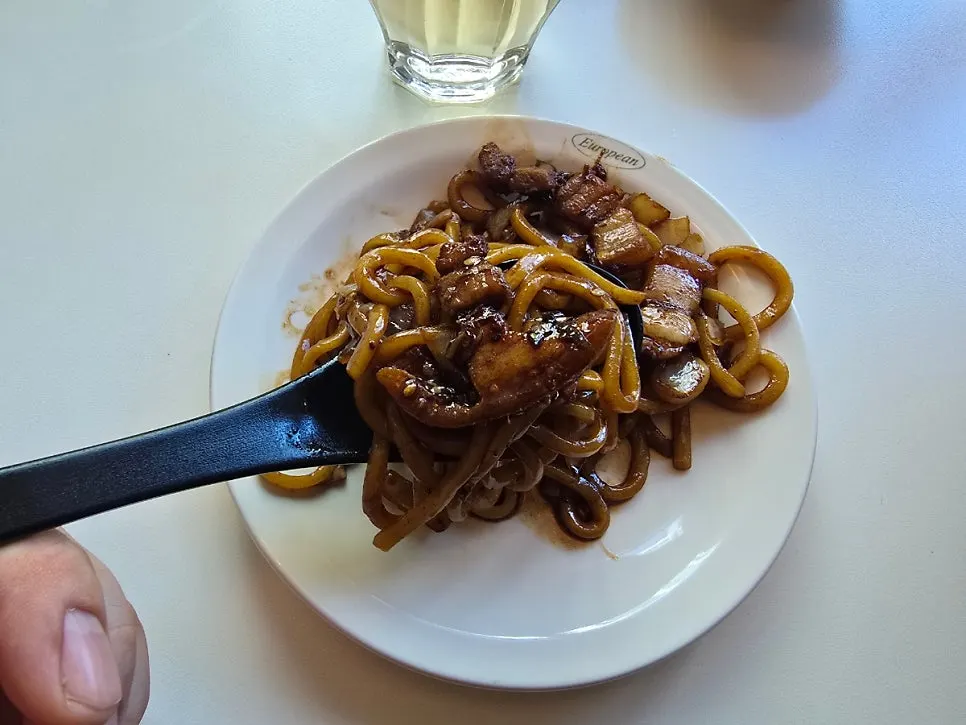 Noodles lifted up with jjajang sauce