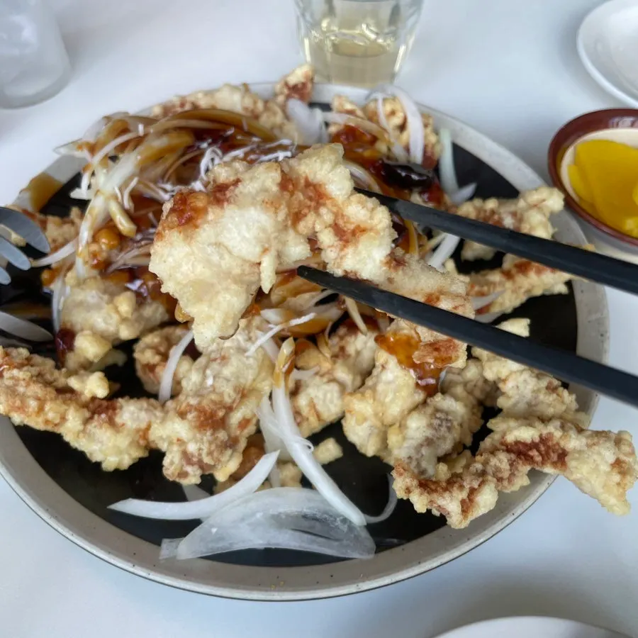 Noodles being lifted from the jjajangmyeon