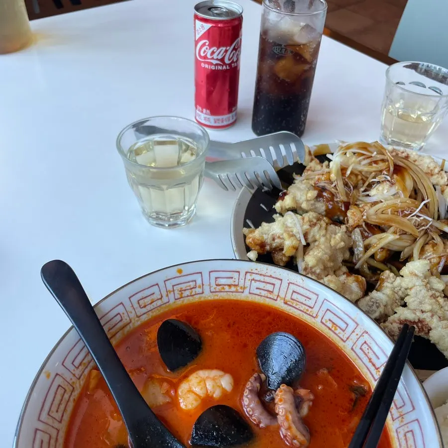 Broth and seafood ingredients in the jjamppong rice