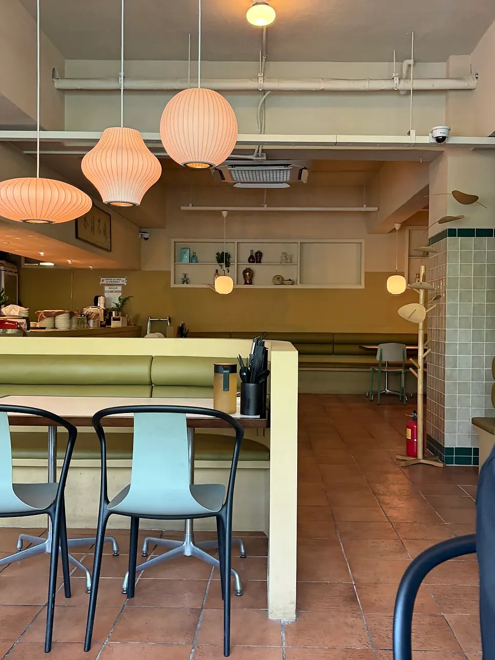 Hall seating lit by George Nelson bubble lamps