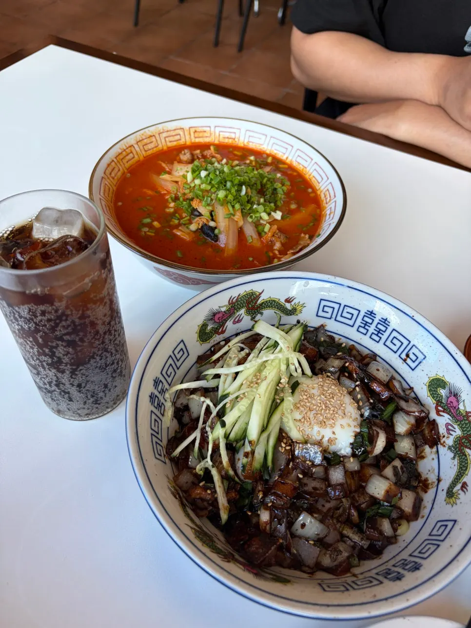 Table spread of kkanpung shrimp with noodle dishes