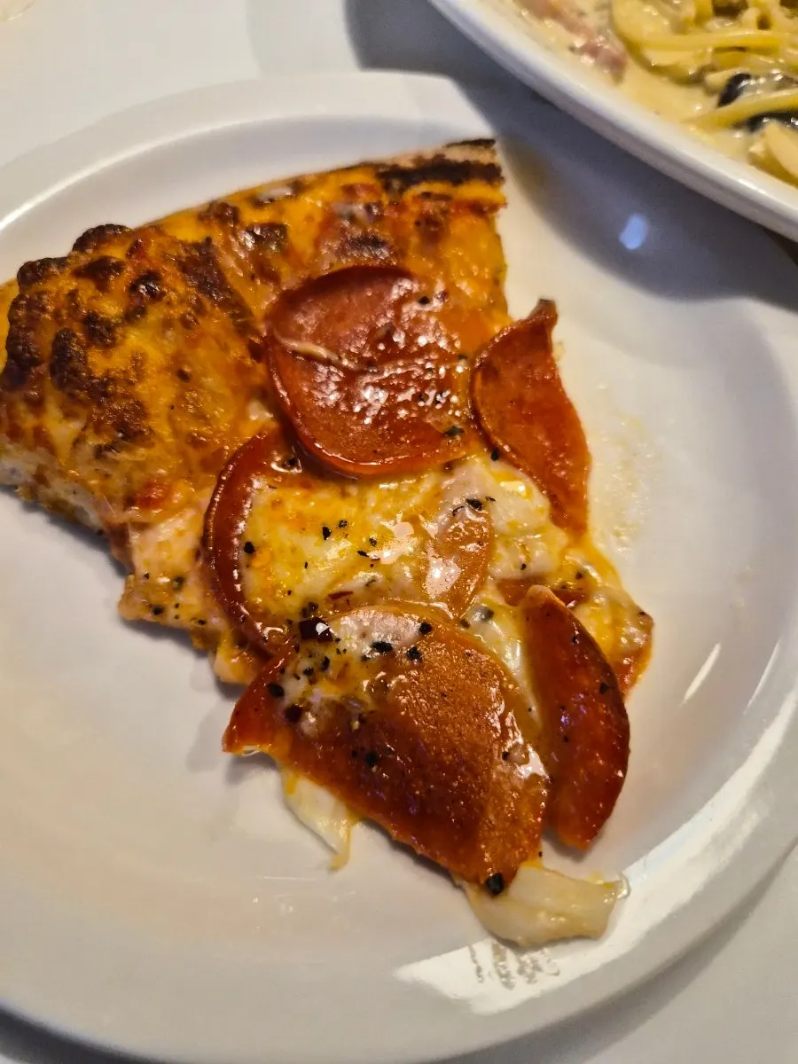 Pepperoni pizza shared slice by slice