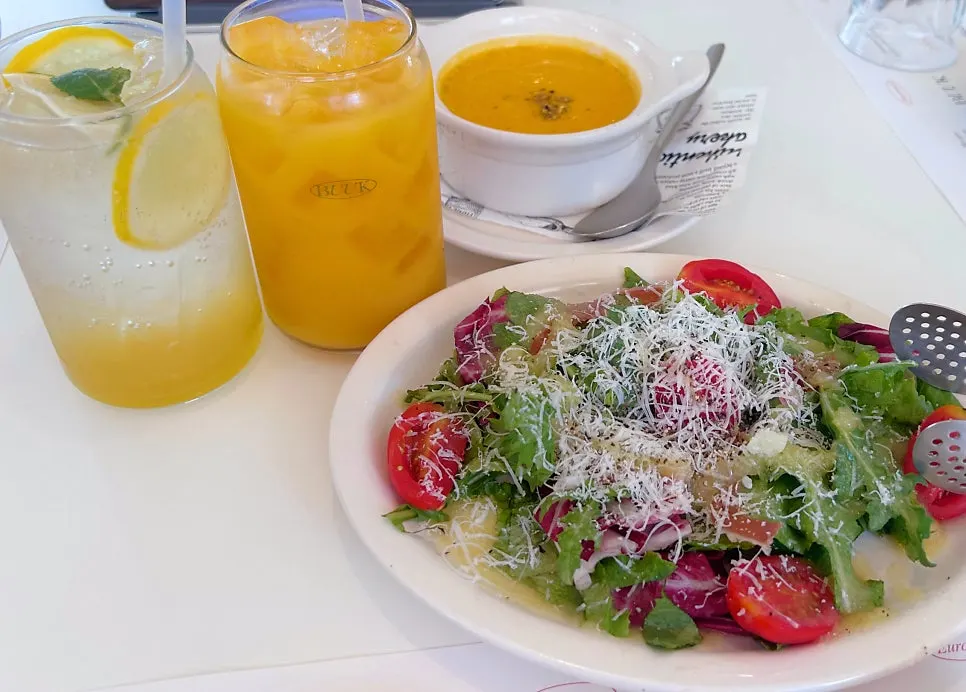 Table with pumpkin soup served