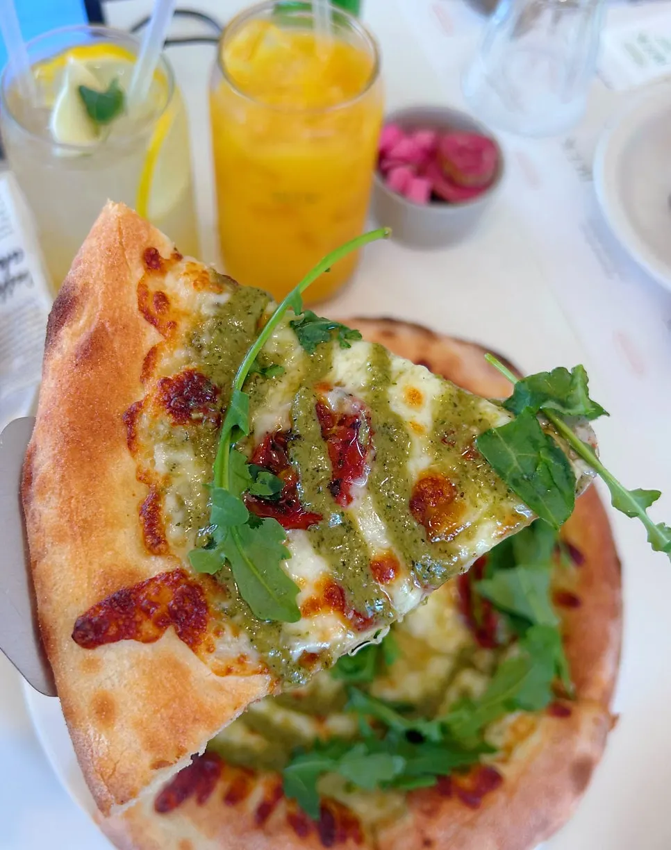 Close-up of pizza topped with roasted tomato